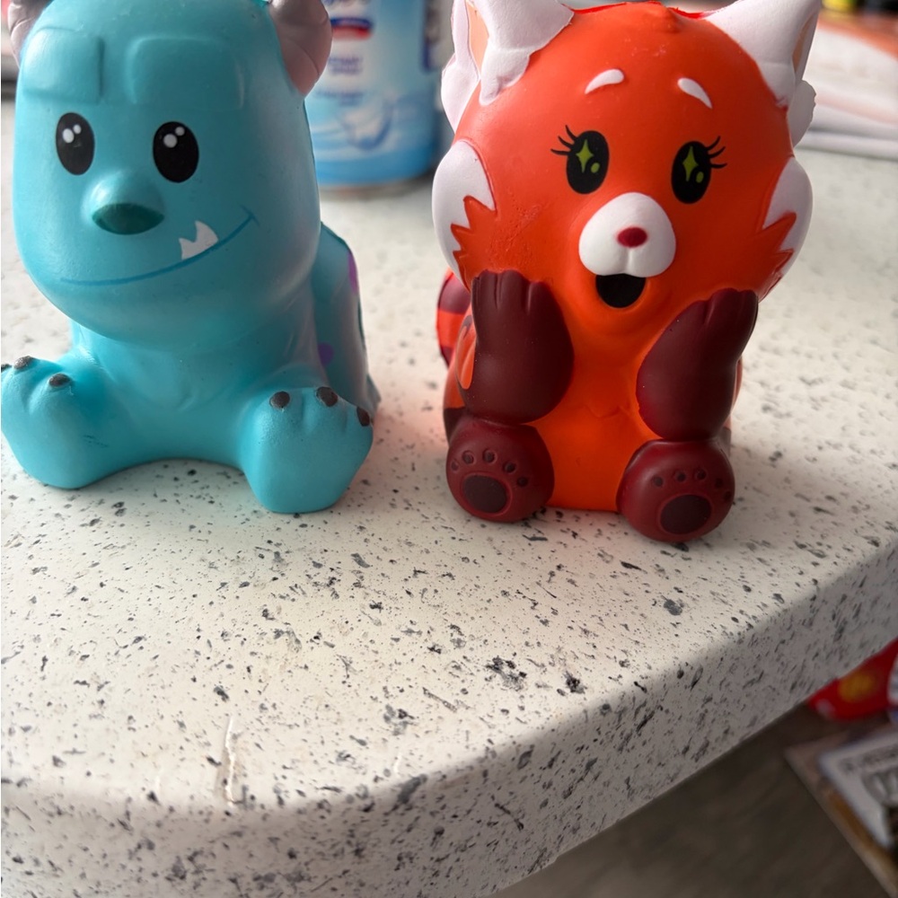 Disney Blue Monster and Orange Fox Figures